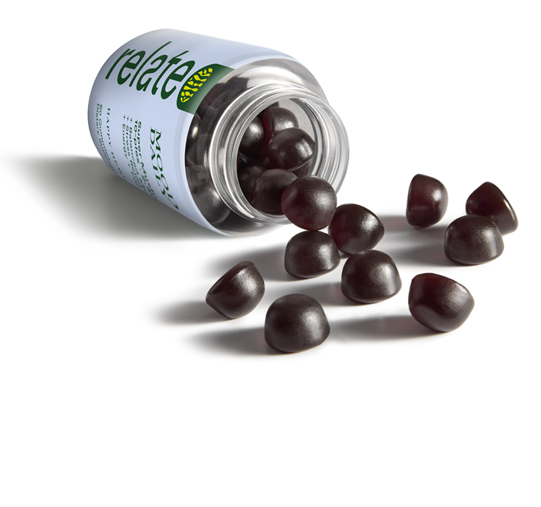 A bottle of Relate Mood Daily dietary supplements with 60 happy berry-flavored gummies, containing a super mushroom 10-plex blend to balance your mood, increase energy, and enhance focus spilled on a table