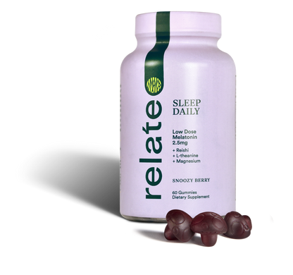 Bottle of Relate Daily Sleep Daily gummies with Snoozy Berry flavor alongside three gummies. They contain low-dose melatonin, reishi, L-theanine, lion's mane, and magnesium.